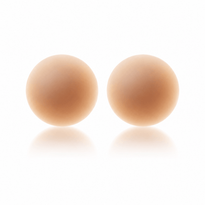 Seamless reusable nipple covers in Caramel, shown as a pair
