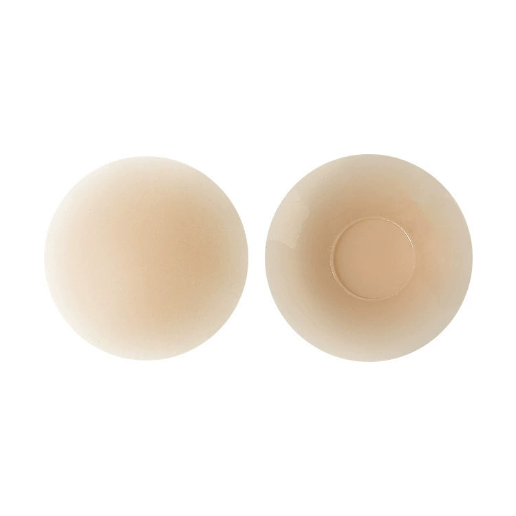 Strong-hold adhesive nipple covers in Creme, shown as a pair